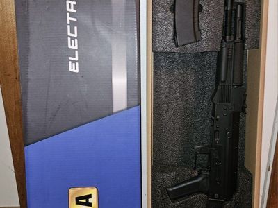 CYMA Sport AK-74 Electric Airsoft Rifle Series with 2 extra magazines included. Battery required.