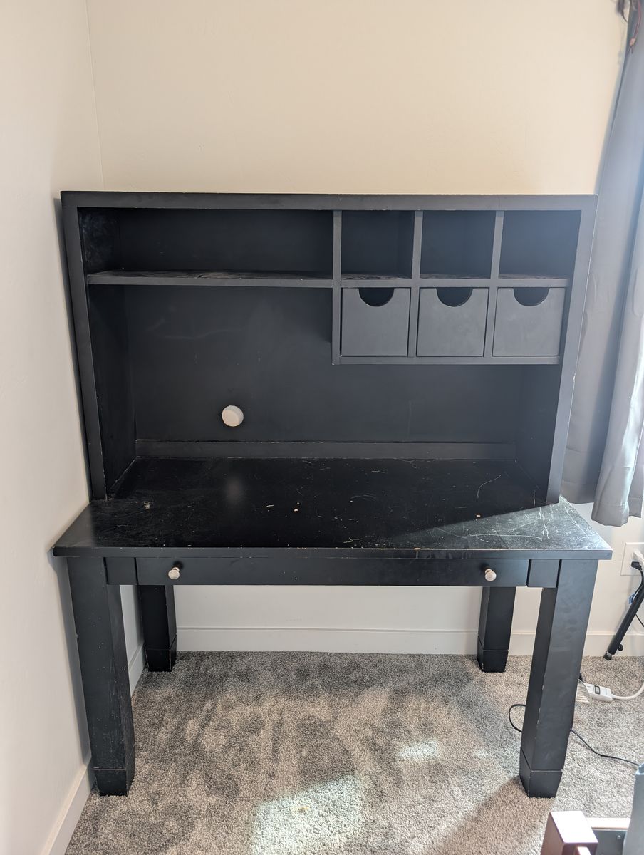Black office desk with hutch