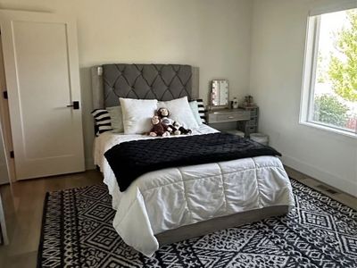 Queen bed frame padded headboard, matching side rails and footboard