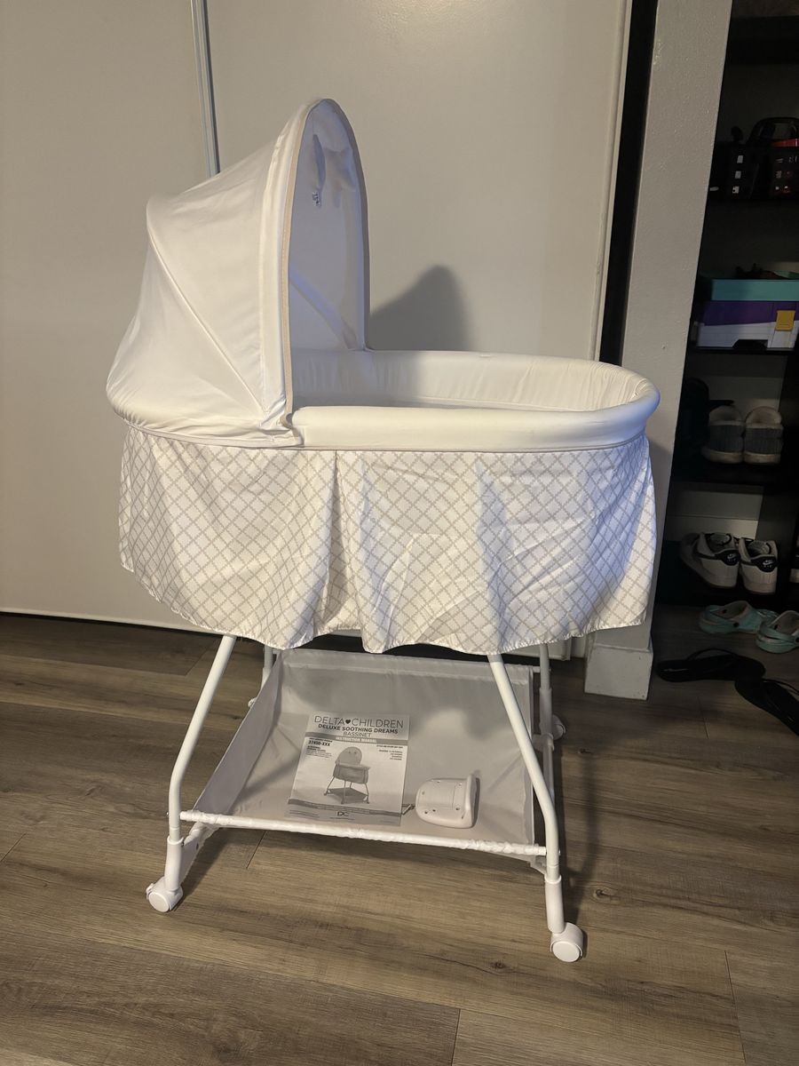 Delta Children Sweet Beginnings Bassinet Portable Cradle w/ Mobile & Storage - White/Grey