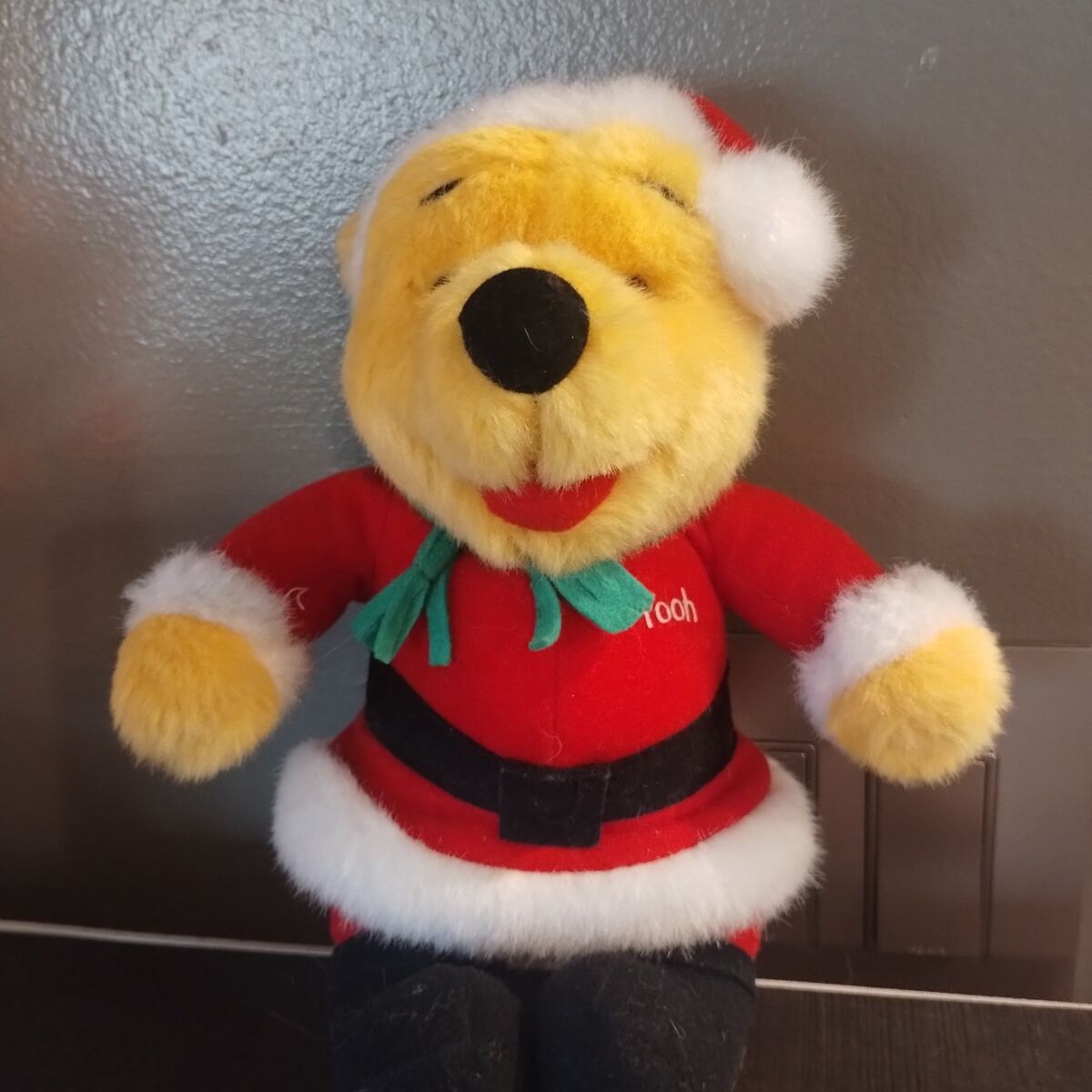“Cute Winnie the Pooh Plush in Santa Suit —
Holid