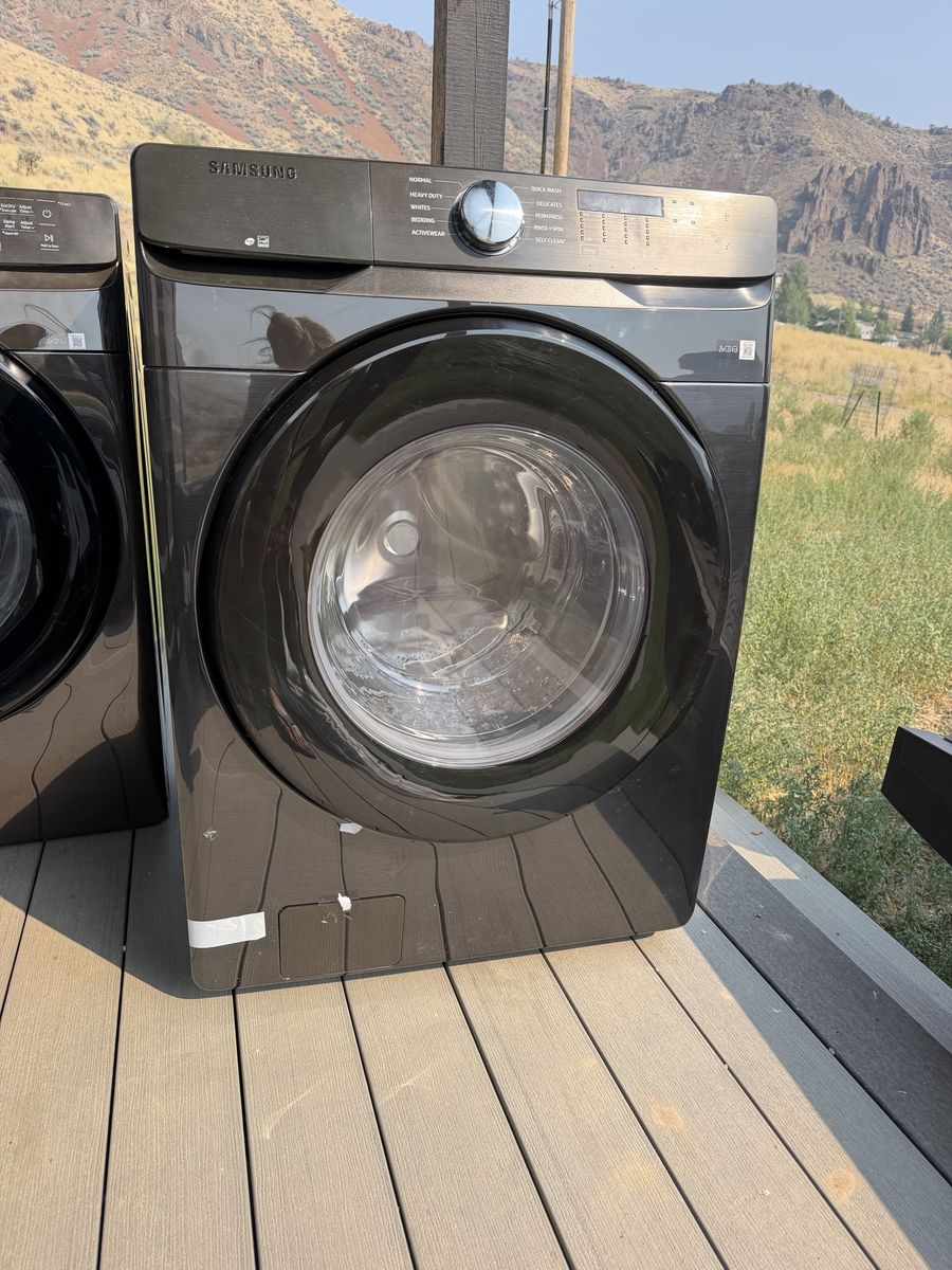 Brand  New Samsung Front Load Electric Washer and Dryer in Black Stainless Steel