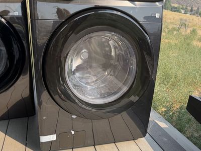 Brand New Samsung Front Load Electric Washer and Dryer in Black Stainless Steel