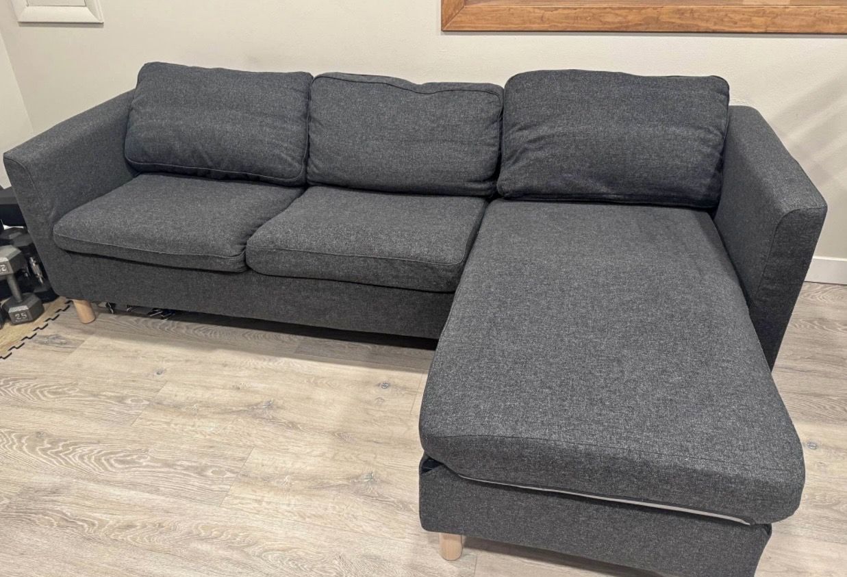 Like New Grey Reversible Chaise Couch-Will Deliver