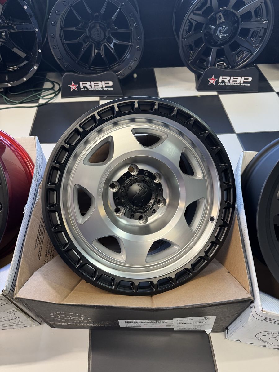 Brand new set of 4 wheels Black 17x8.5 RhinoSilver/Black lug pattern 6x139.7 off set -10mm