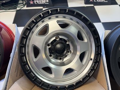 Brand new set of 4 wheels Black 17x8.5 RhinoSilver/Black lug pattern 6x139.7 off set -10mm