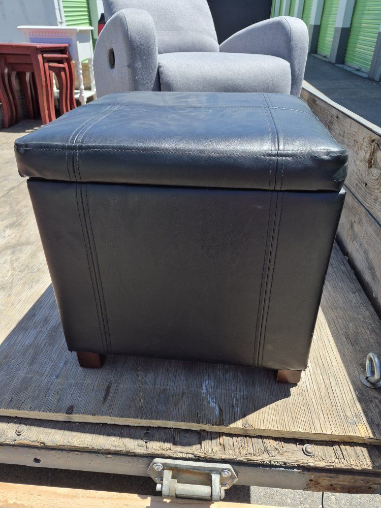 Black faux leather cube storage ottoman