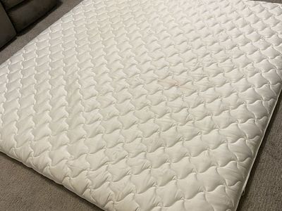 Creamy White King Sized Luxurious Mattress Topper - Cooling Nylon Cover. Our Guests raved about its comfort level.