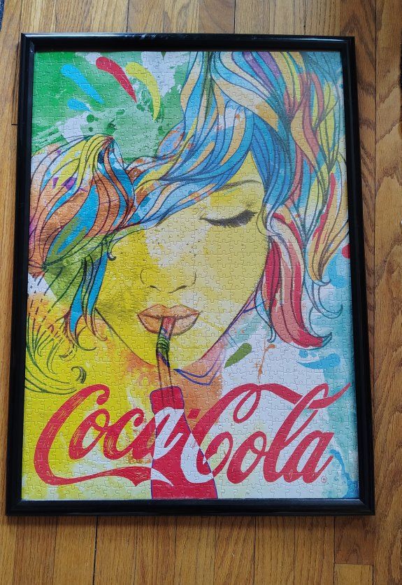 21"x 29" Coca-Cola art deco look framed puzzle. Gr