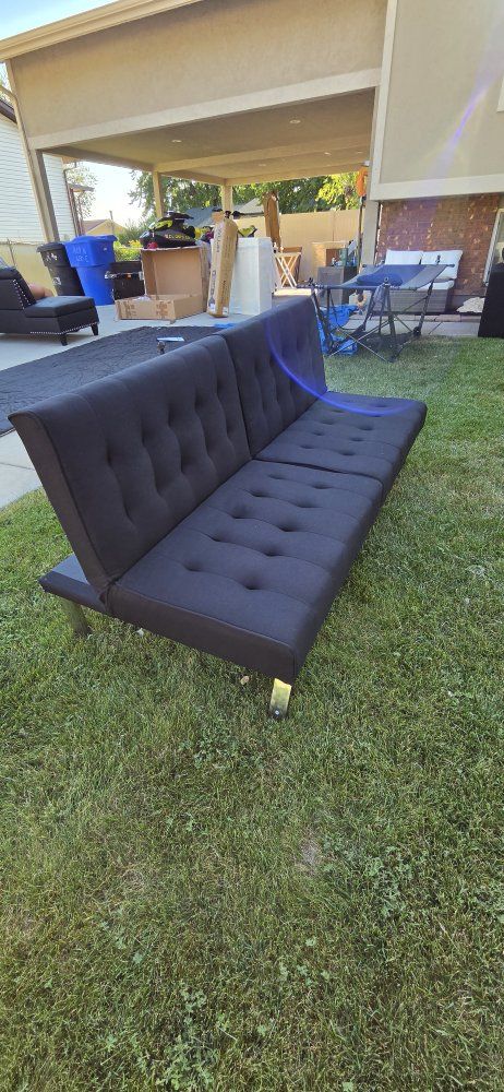 Black Tufted Convertible Futon Sofa Bed with Chrome Legs