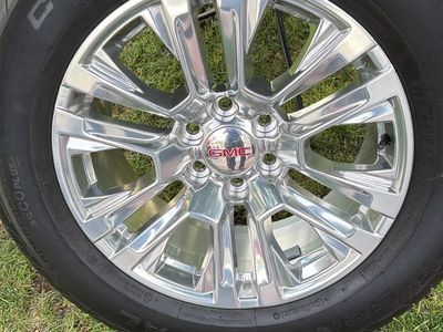 Like new GMC sierra 1500 wheels and tires