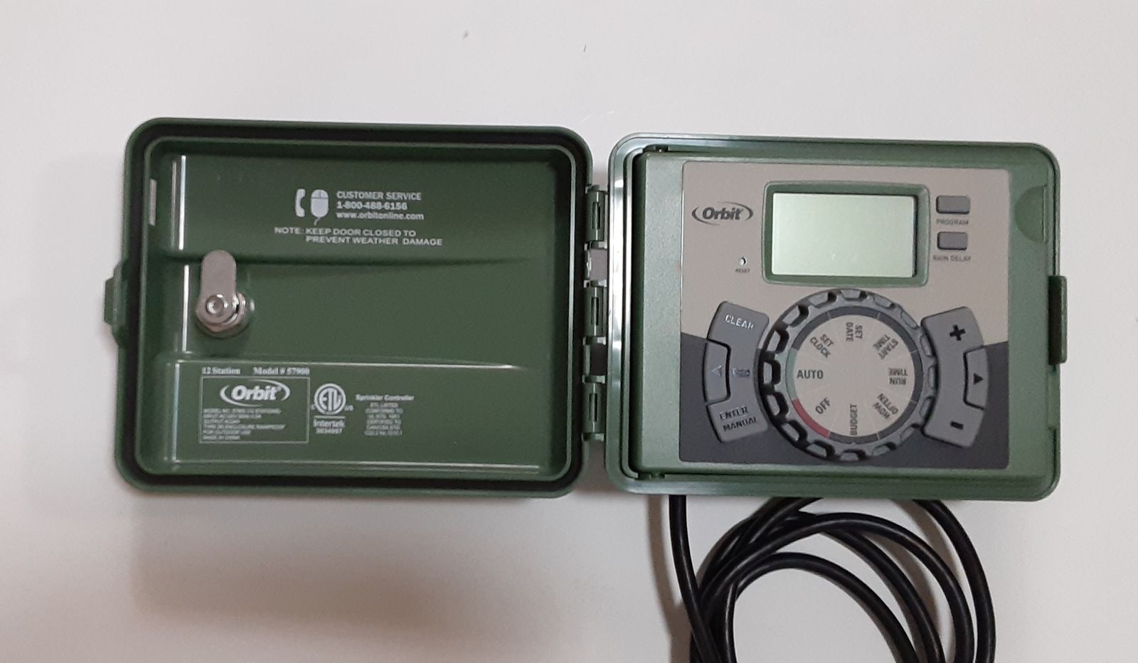Orbit 57900 12-Stations/Zones Indoor/Outdoor Swing Panel Sprinkler System Timer/Controller in New Condition