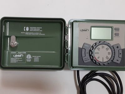 Orbit 57900 12-Stations/Zones Indoor/Outdoor Swing Panel Sprinkler System Timer/Controller in New Condition