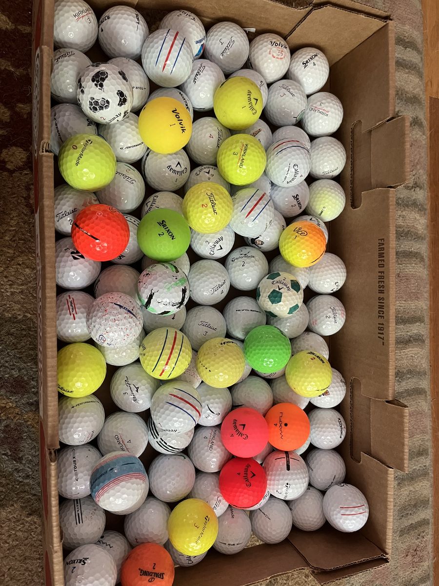 100 used golf balls