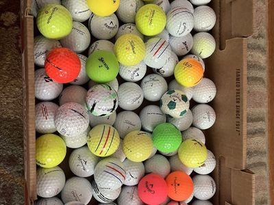 100 used golf balls