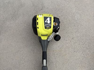 Ryobi 4 stroke gas lawn trimmer w/attachments