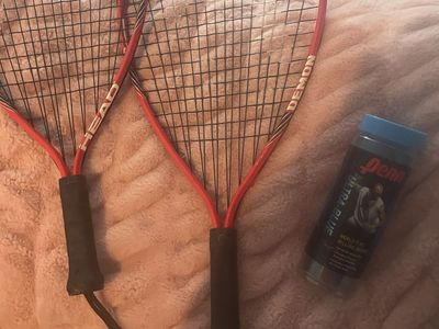 Two racquets and balls.