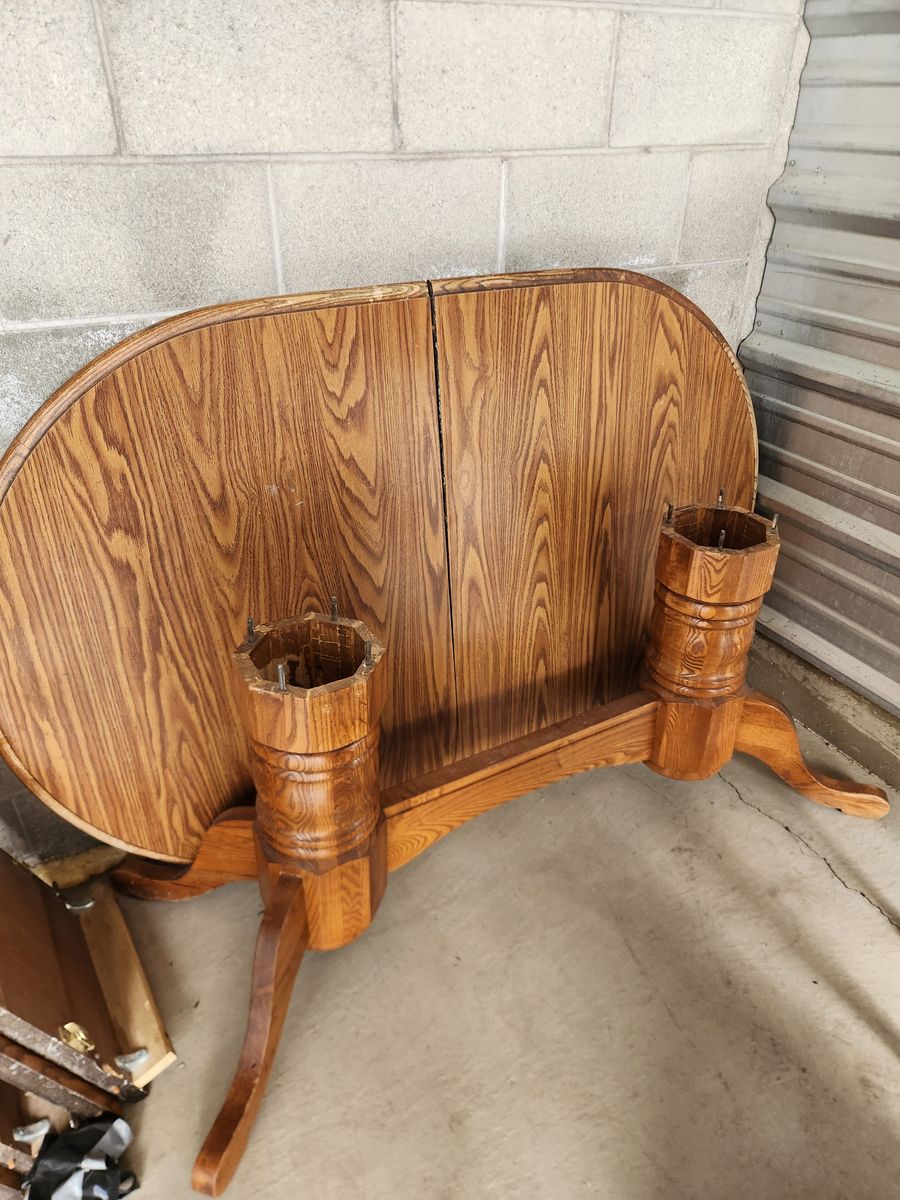 Large wooden table w/ 4 extra leaves, 3 original chairs