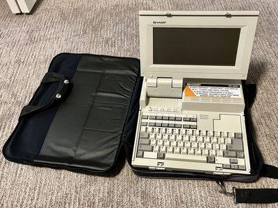 Vintage Sharp PC-4501 Laptop Computer with Soft Carrying Case