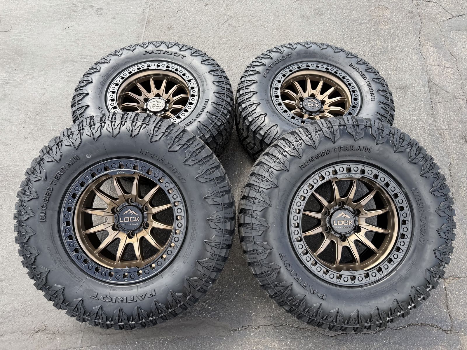 New LT295/70r17 RT Bronze Lock 6x135 Ford F150 6