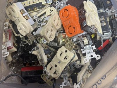 Used 15 and 20 amp duplex, outlets, and assorted other electrical items. Lots of ivory covers, all different sizes..