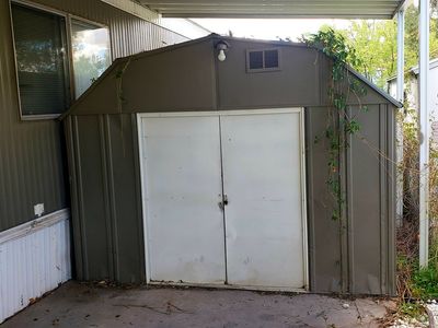 Metal 10X10 storage shed with power outlets and lights