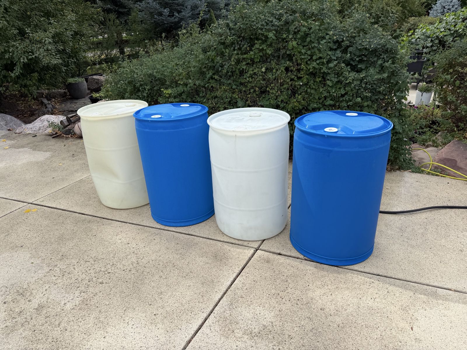 55 Gallon Water Storage Barrels - Blue and White Plastic Drums