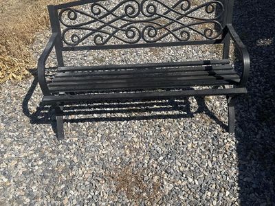 Black Metal Garden Bench with Decorative Scrollwork Back