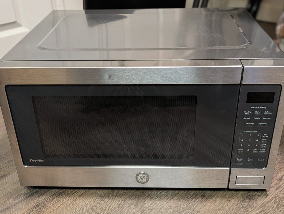1100W GE Profile Stainless Steel Countertop Microwave Oven with Sensor Cooking