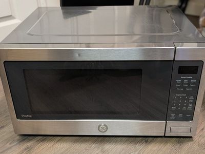 1100W GE Profile Stainless Steel Countertop Microwave Oven with Sensor Cooking