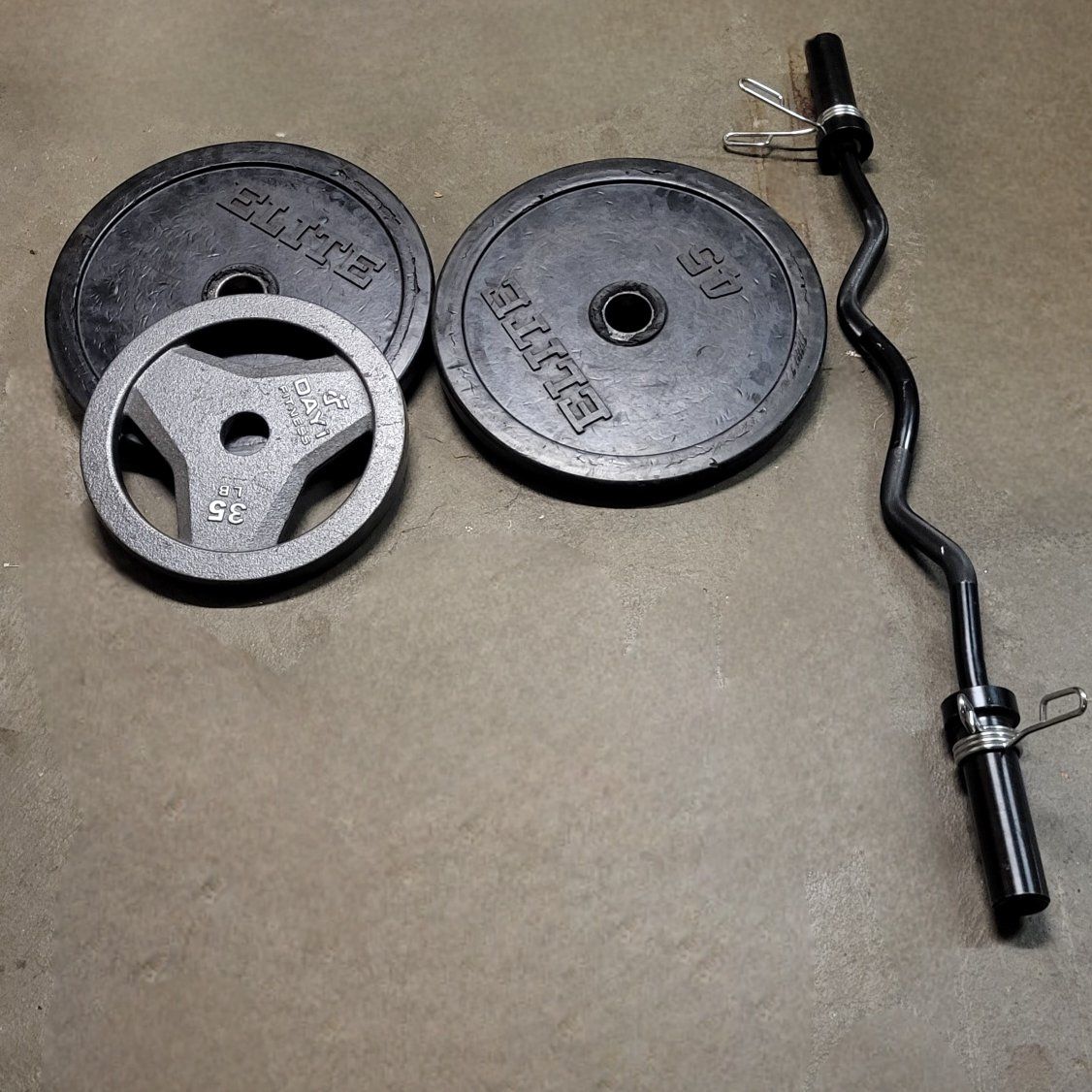 125 pounds of weights + curbar