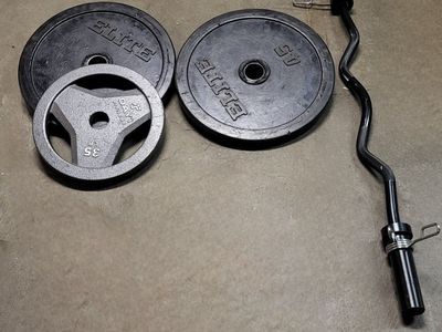 125 pounds of weights + curbar