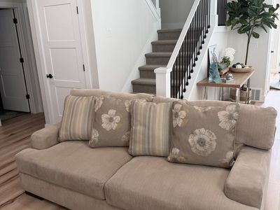 Cream couch with reversible pillows!