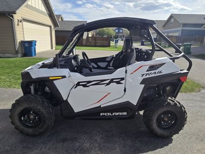 2 polaris RZR's