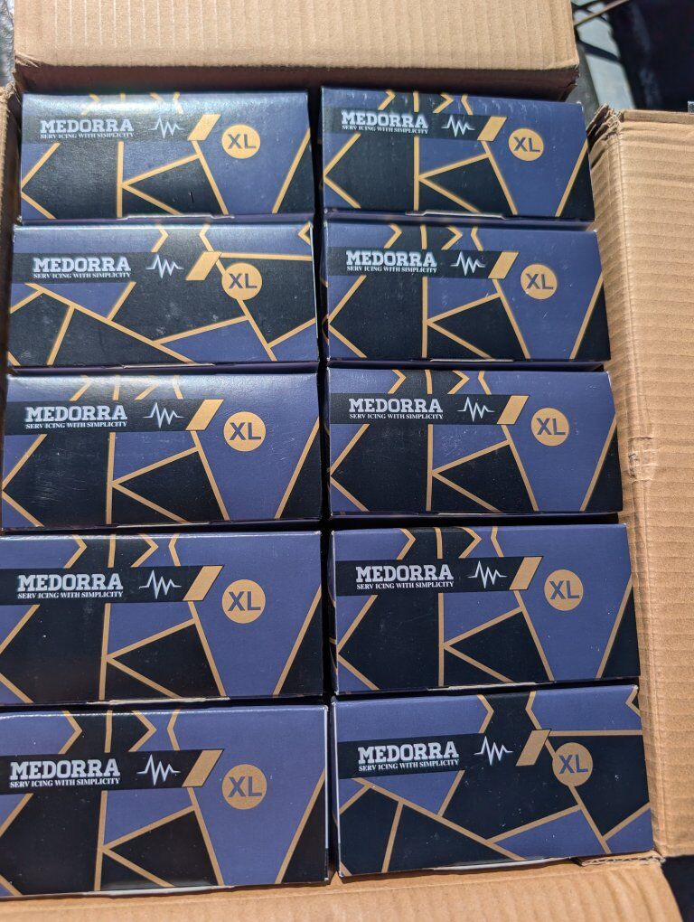 New Boxes of Vinyl Gloves