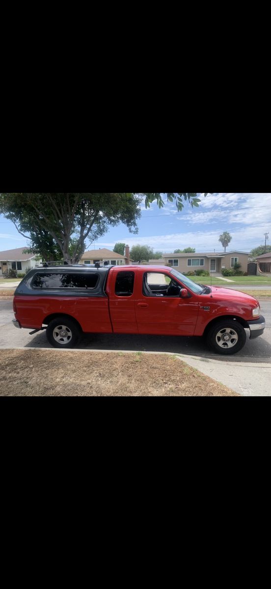 Ford F-150 Camper Shell with Roof Racks