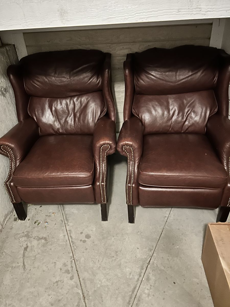 Two recliner leather brown chairs