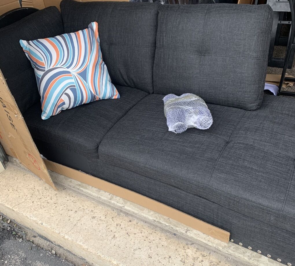 BRAND NEW COUCH IN BOX(LOUNGE SECTION)