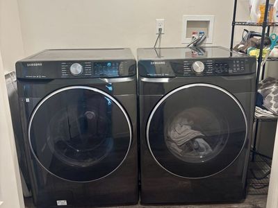 Samsung Front Load Washer & Dryer Set - Black Stainless Steel with Steam & Smart Features