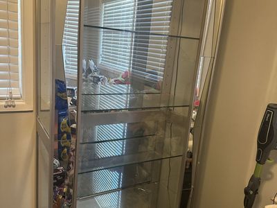 Modern Mirrored Glass Display Cabinet with Built-In Lighting and Adjustable Shelves