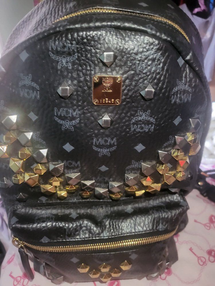 MCM Stark Studded Backpack Black Visetos Leather Gold and Silver Studs