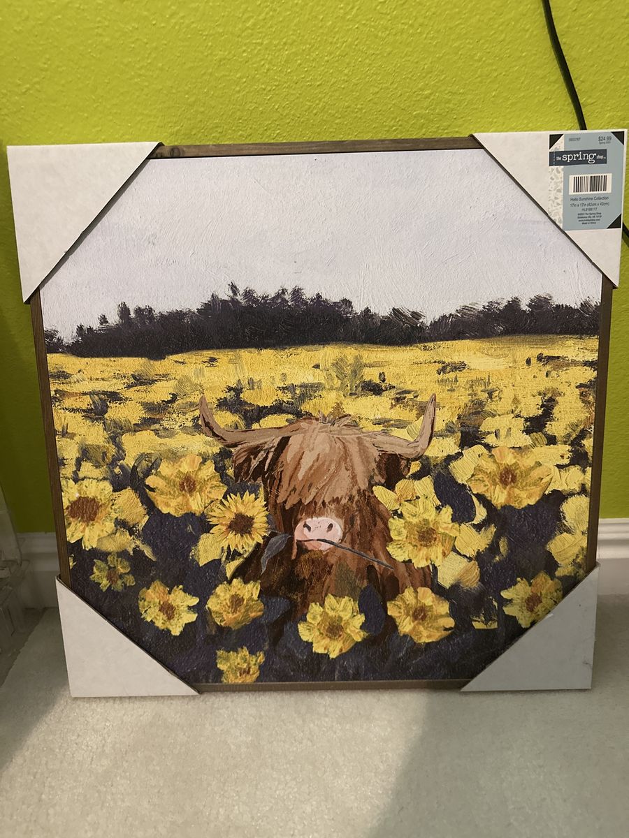 Nib highland cow with sunflowers