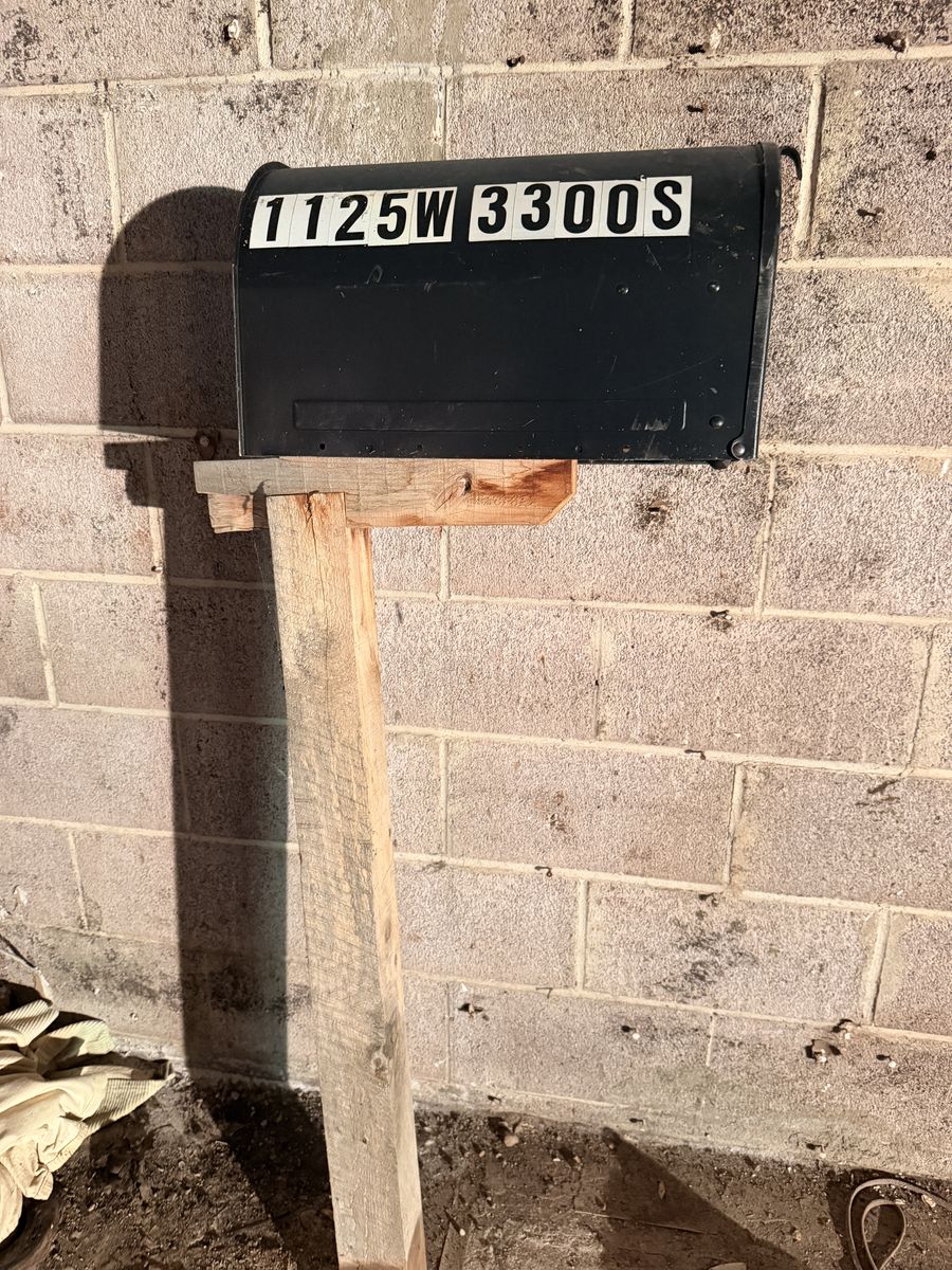 Large locking mailbox with post.