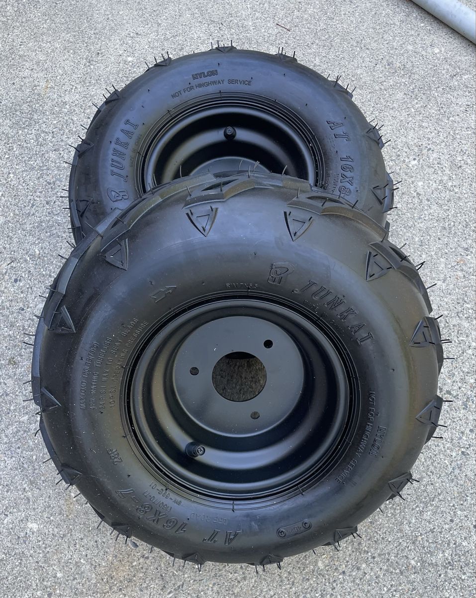 2- 16X8-7 Tubeless tires and rims.