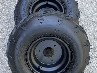 2- 16X8-7 Tubeless tires and rims.