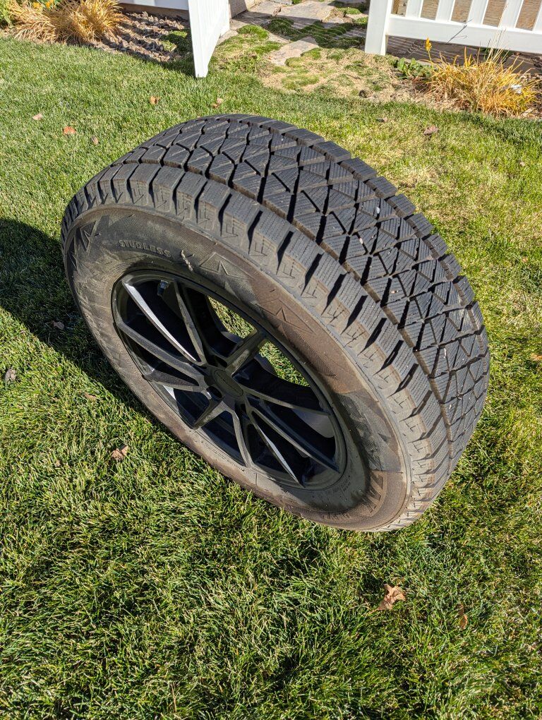 4 Bridgestone 235/65 R17 snow tires & wheels