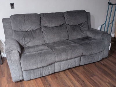 Gray dual recliner sofa from Ashley Furniture