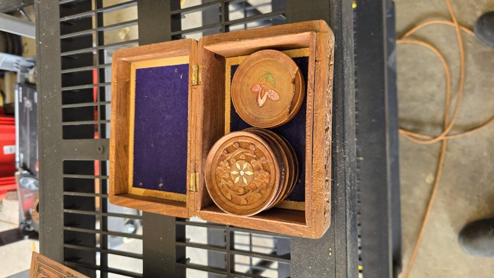 Old vintage wooden box and coasters