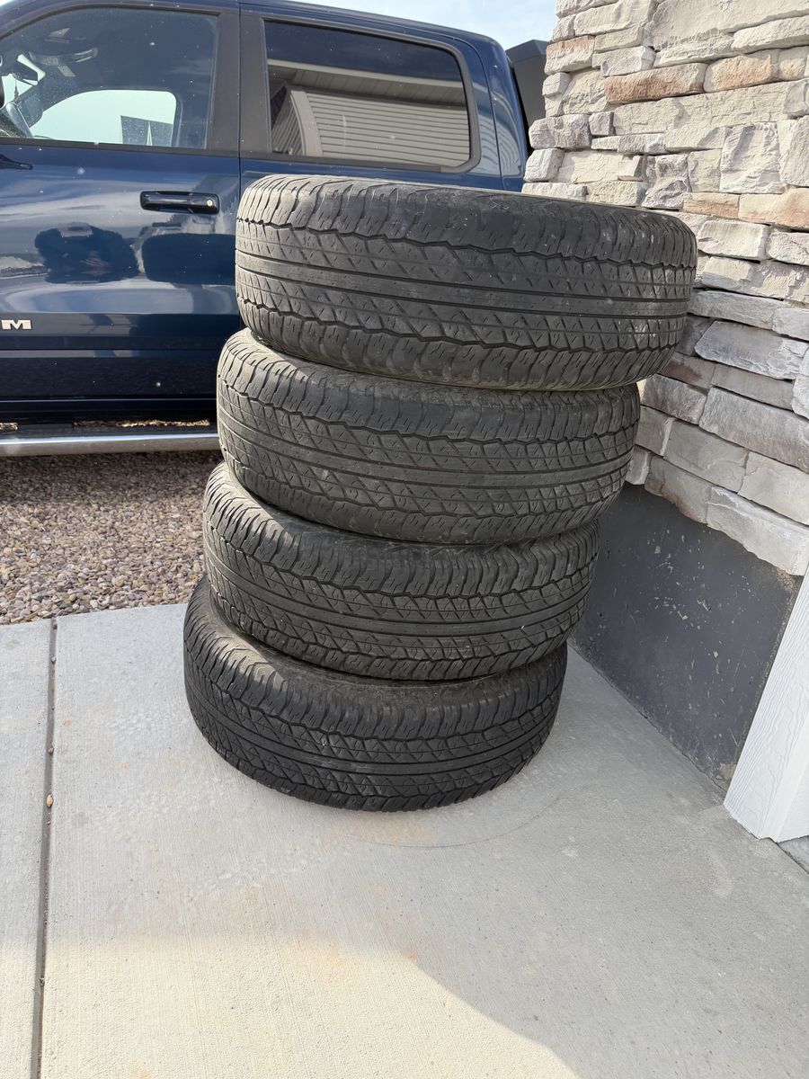 4 P265/70R17 Dunlop AT20 Tires