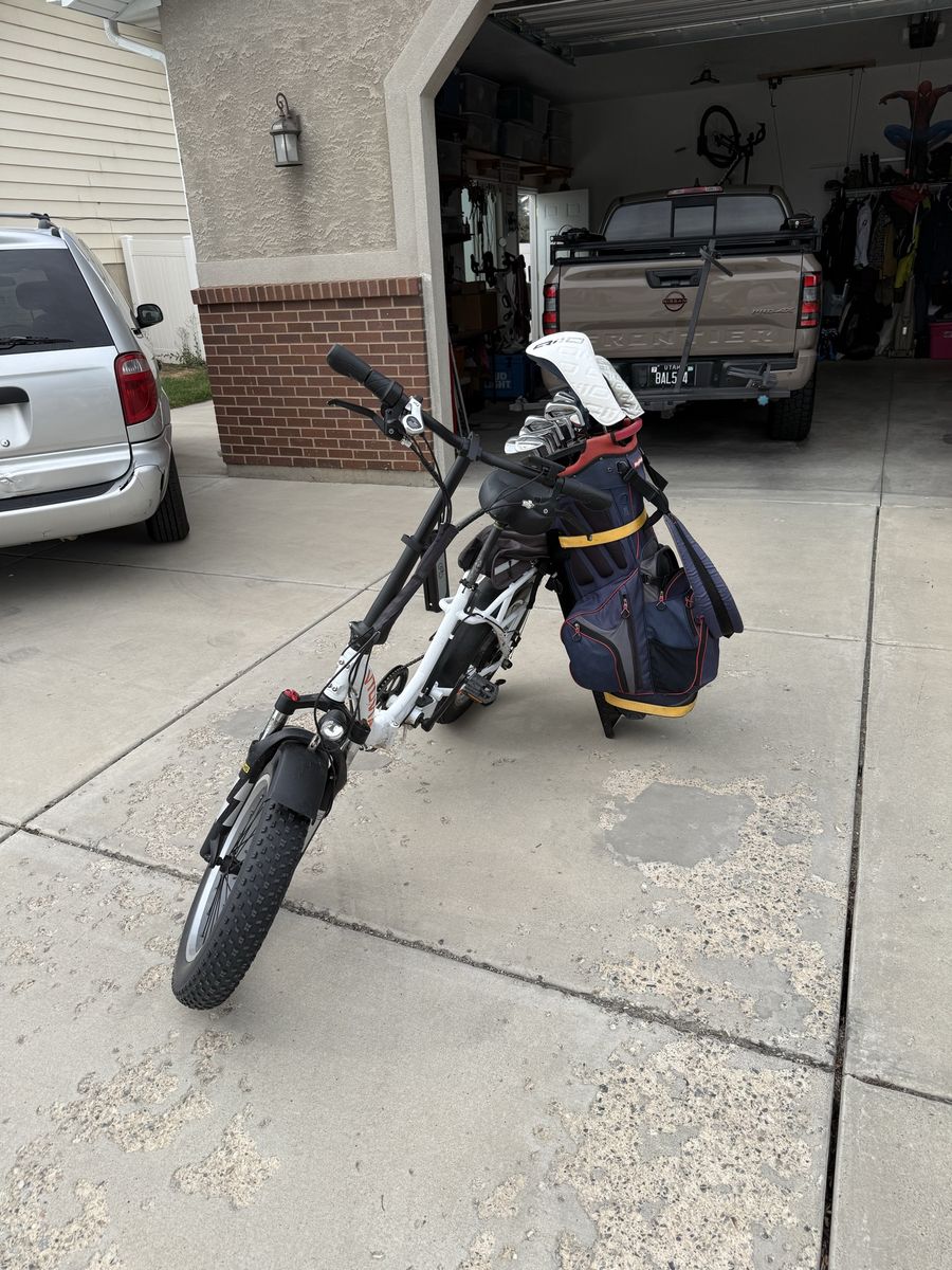 Golf e-bike with two bike hitch mount. 